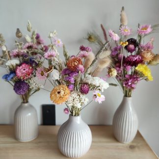 Dried Flower Arrangements In Grey Ceramic Bud Vases
